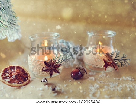 New Year\'s still life beautiful glass bottles with fire and miscellaneous items