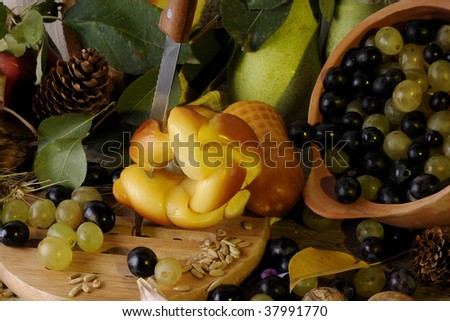 knife in cheese, fruits in recipe and vegetables
