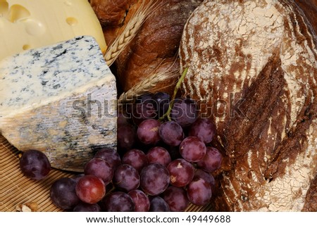 one bread, cheese and fruits