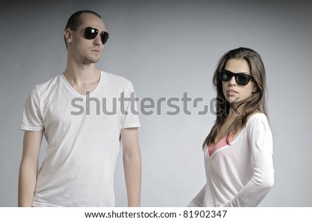 young people posing with sunglasses