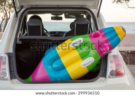 The car trunk full of beach accessories