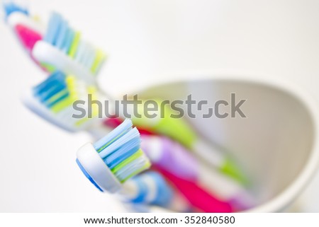 group tooth brush closeup white background shot