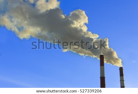 Thick smoke from factory chimneys. Pipe with smoke. Heat energy network. Harmful emissions into the atmosphere. Air pollution and disruption of the Earth's ozone layer. Water pollution and nature. 3