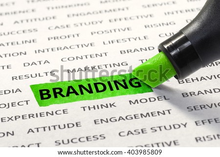 Branding message highlighted with marker on paper of other related words. For direction of business strategy success concept
