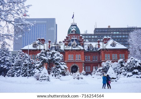 View of the Former Hokkaido Government Office in Sapporo, Hokkaido, Japan. Traveler take a photo at the Former Hokkaido Government Office in Sapporo, Hokkaido, Japan in winter