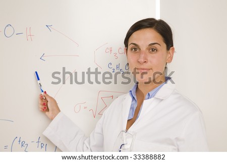 science professional writing on white board