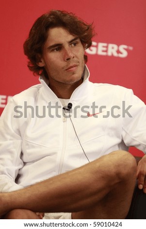 TORONTO- AUGUST 13: Rafael Nadal gives an interview in press conference after he won a tournament with Philipp Kohlschreiber in the Rogers Cup 2010 on August 13, 2010 in Toronto, Canada.