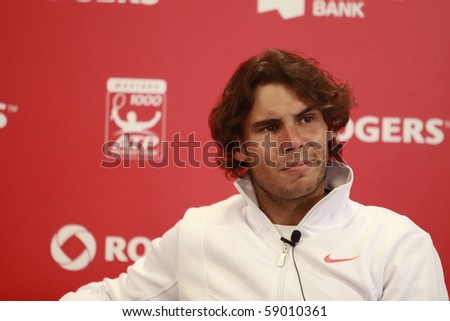TORONTO- AUGUST 13: Rafael Nadal gives an interview in press conference after he won a tournament with Philipp Kohlschreiber in the Rogers Cup 2010 on August 13, 2010 in Toronto, Canada.