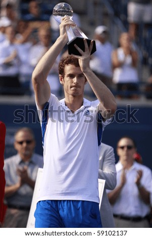 TORONTO: AUGUST 15. Andy Murray greets his fans after he won a tournament with Roger Federer in the Rogers Cup 2010 finals on August 15, 2010 in Toronto, Canada.