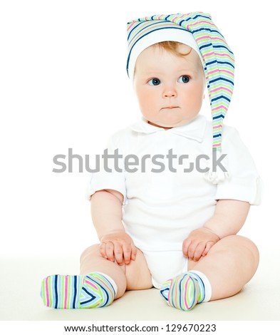 babe in striped socks and hat