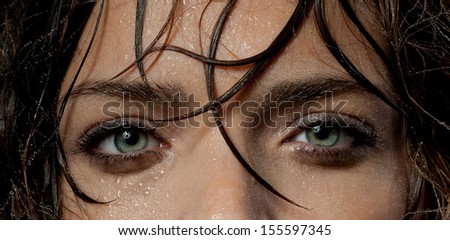 wet woman\'s face, eyes