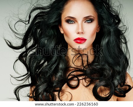 Black Hair. Fashion Girl Portrait. long Hair and red lipstick.