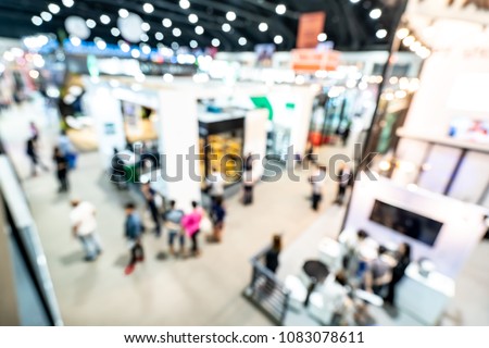 Abstract blurred defocused trade event exhibition background, business convention show concept. Top view.