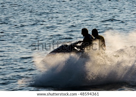 Two men on a water bike