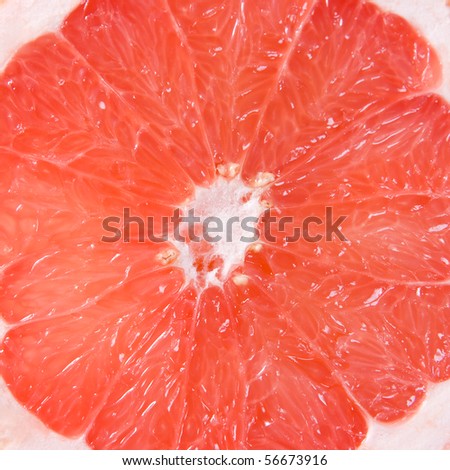 Slices of red grapefruit close