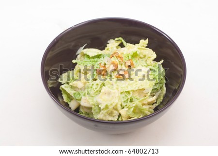 Cabbage salad with apples, walnuts and Pamelo with a light mustard dressing