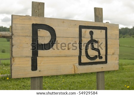 Wooden Handicapped Parking Only sign. Permit Parking sign For disabled person.