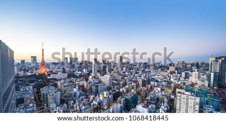 Asia business concept for real estate and corporate construction - panoramic urban city skyline aerial view under twilight sky and neon night in hamamatsucho, tokyo, Japan