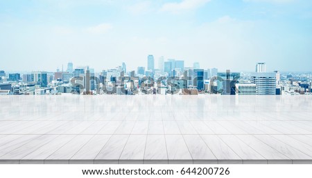 Business concept - Empty marble floor top with panoramic modern cityscape building bird eye aerial view under sunrise and morning blue bright sky of Nagoya, Japan for display or montage product