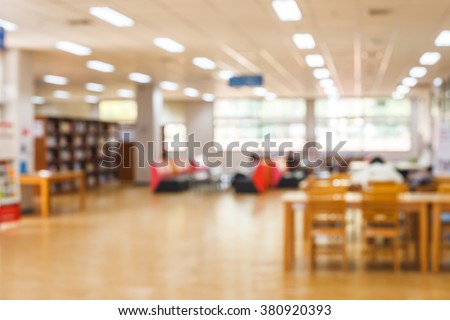 blur image of the library or Book shelf Knowledge and Research in Education. Library is a collection of sources of information and similar resources and sun light