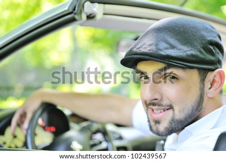 Young guy behind the wheel