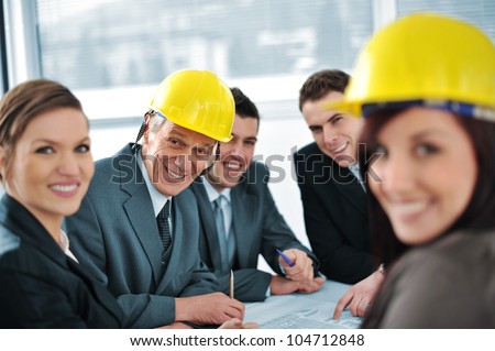 Business people in conference room talking about future plans
