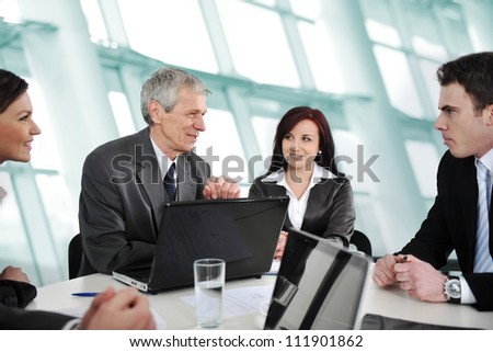 Group of business people in office having consulting