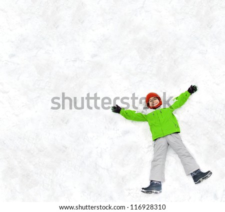 Kid making a snow angel