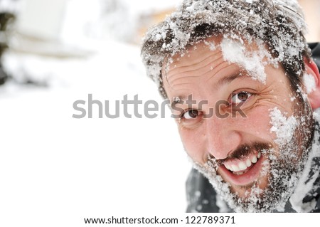 Man in snow, face closeup fun