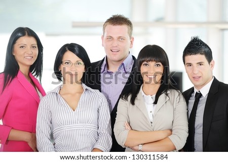 Portrait of a young successful business team at office