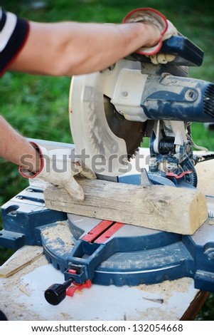 Wood cutting with industrial machine tool