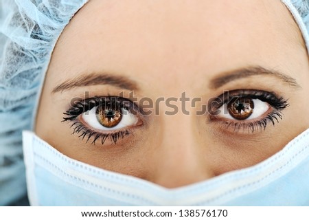 Close-up of urgent medic eye female doctor
