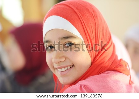 Muslim and Arabic girls learning together in group