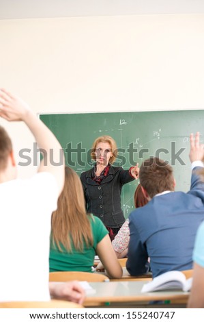Professor pointing her finger to a student