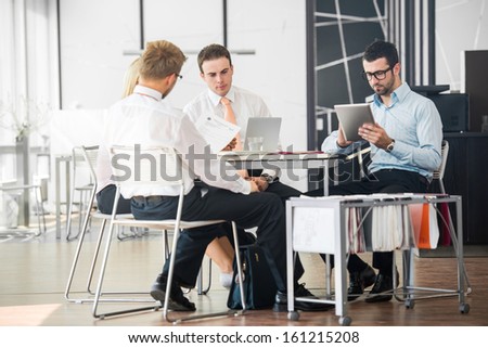 Corporate Team Working On A Meeting In Office