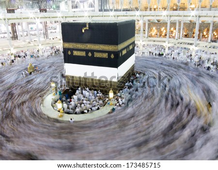 Kaaba the Holy mosque in Mecca with Muslim people pilgrims of Hajj praying in crowd (newest and very rare images of Holiest mosque after latest widening 2013-2014)