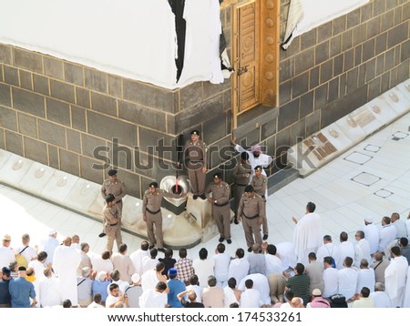 MECCA, SAUDI ARABIA - OCTOBER 13: Muslim pilgrims, from all around the World, revolving around the Kaaba on October 13, 2013 in Mecca, Saudi Arabia.