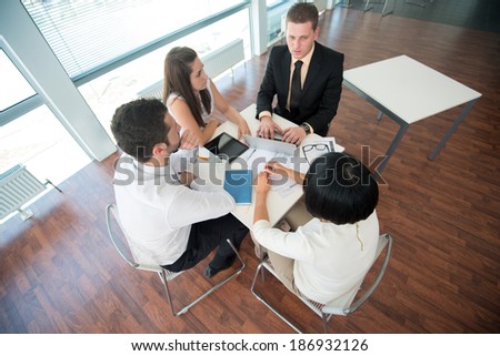 Group of corporate people at work in company environment