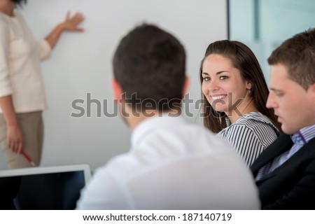 Happy business woman smiling in company work meeting