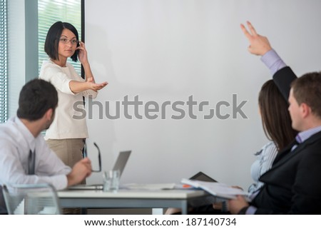 Team of managers in a working meeting in office