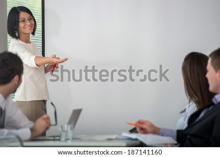 Business people working as a team in company meeting