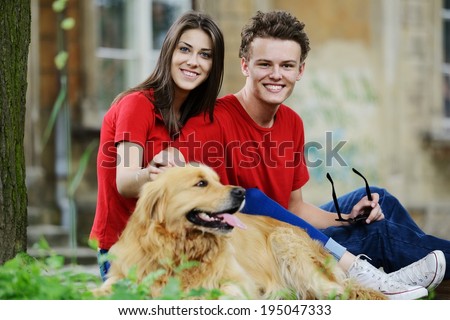 Urban stylish trendy young teenage people with dog