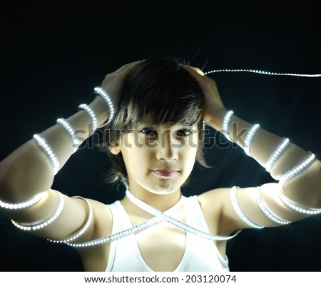 Portrait of kid with led strip light concept