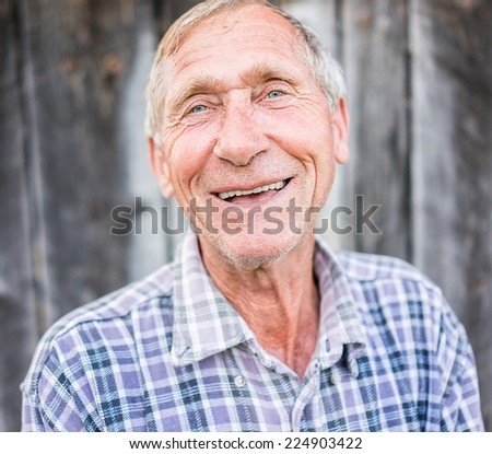 Happy smiling elder senior man portrait