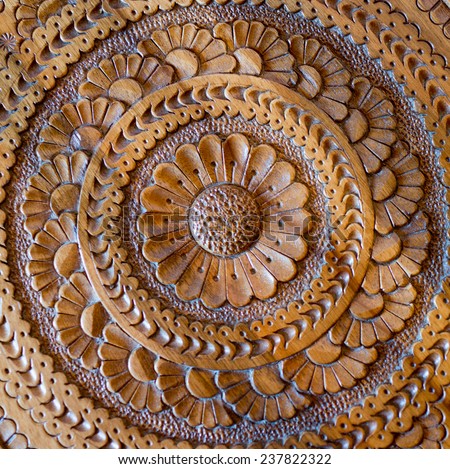An artistic carved floral pattern in wood of an islamic arabic nature
