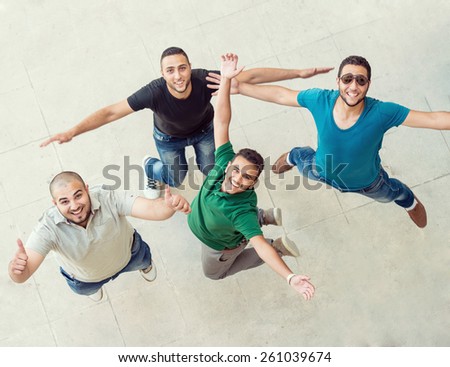 Group of students happy jump