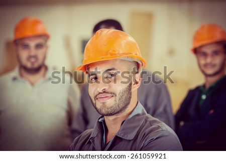 Workers in industrial factory