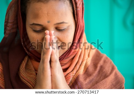 Muslim and Christian women praying together
