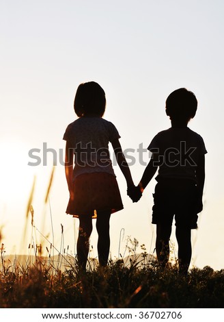 Romantic Children Stock-photo-two-children-sunset-romantic-scene-36702706