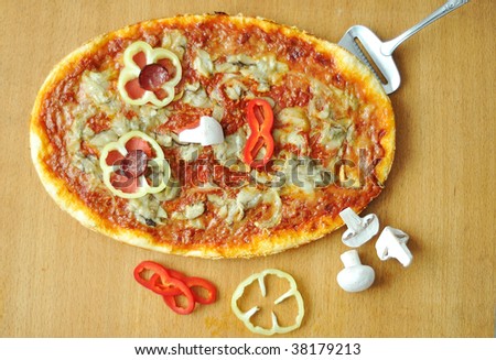 Prepared pizza with many colors on and some ingredients
